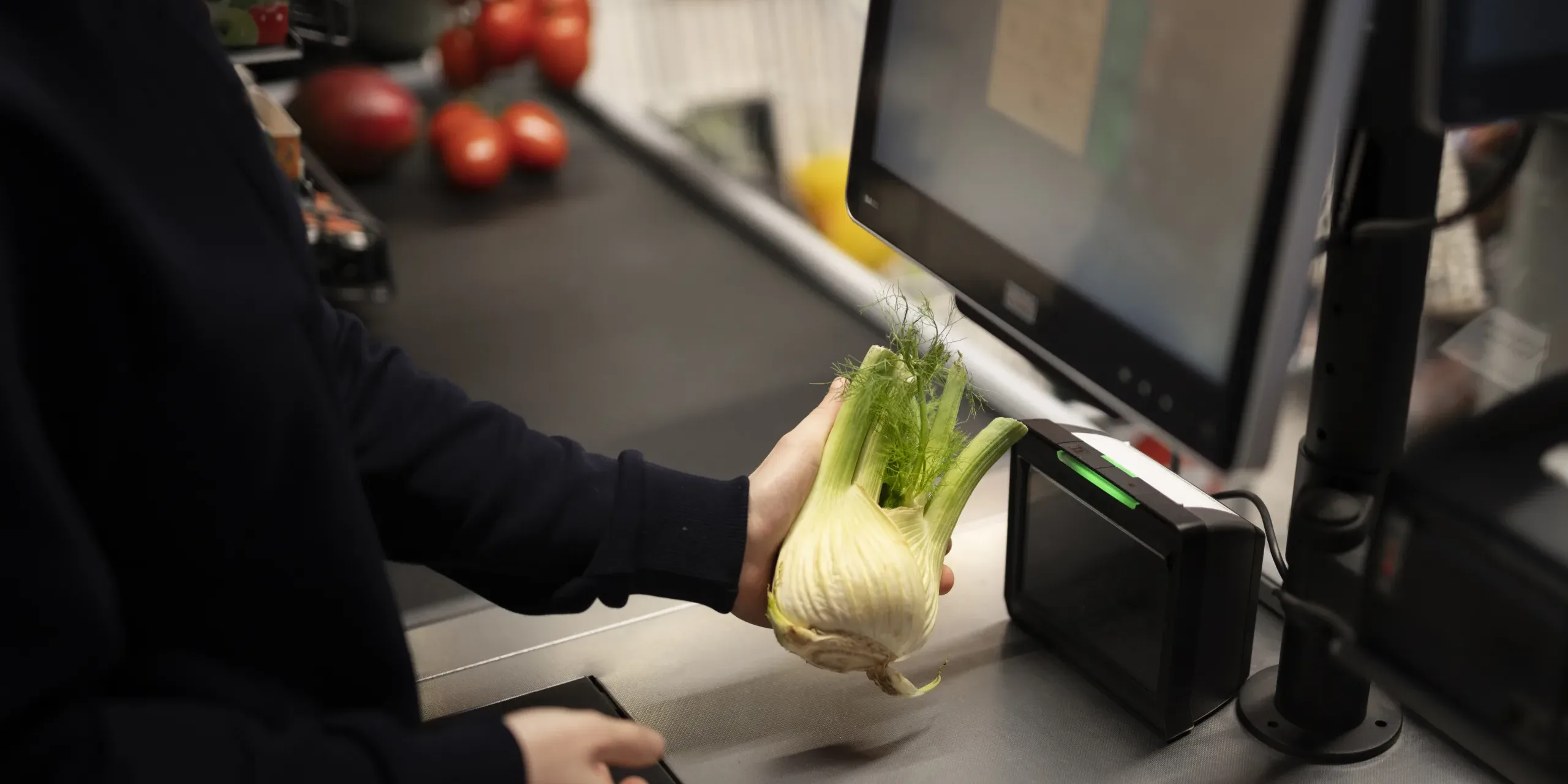worker-scanning-vegetable-supermarket